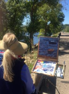 artist painting from the back